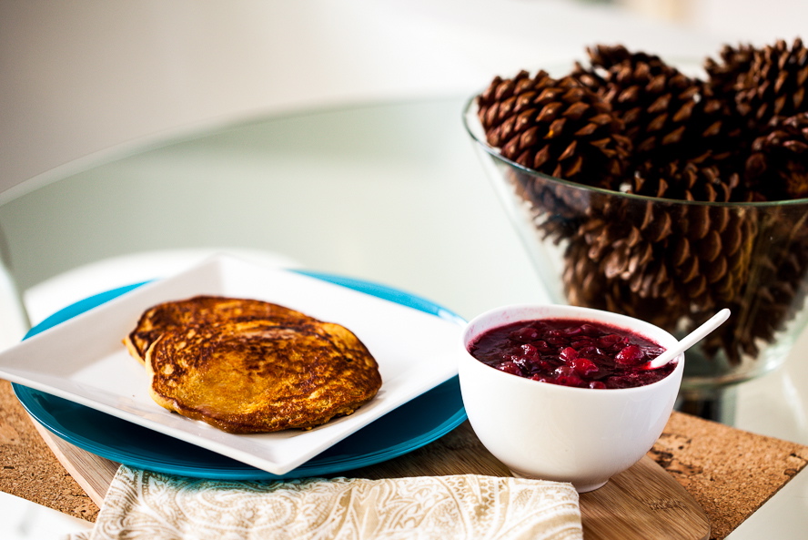 Persimmon Cornmeal Pancakes with Maple Cranberry Sauce 