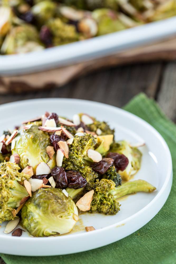 Cheesy Maple Roasted Brussels Sprouts & Broccoli with Dried Cherries & Almonds