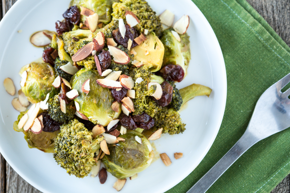 Cheesy Maple Roasted Brussels Sprouts & Broccoli with Dried Cherries & Almonds